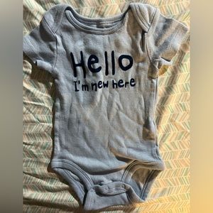 Hello I’m new here baby boy onesie. Light blue. 3-6 months. Barely worn.